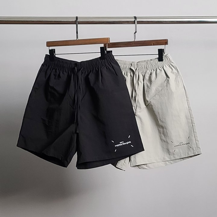●7월 판매 7위● MAISON MARGIELA 메종마르지엘라 레터링 프린팅 나일론 5부 팬츠