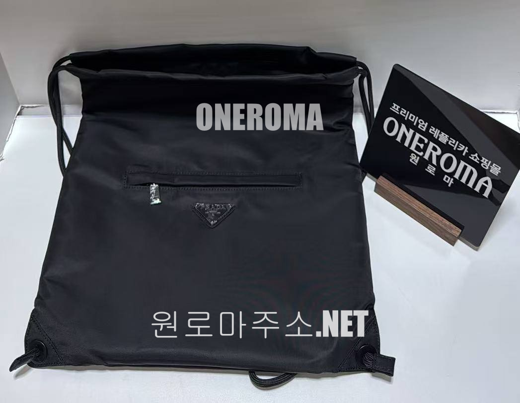 이*수 고객님 프라다 리나일론 드로스트링 백팩